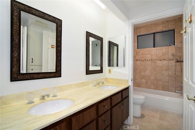 18600 Clark St Unit 102, Tarzana, CA 91356 - full bath featuring double vanity, toilet, and shower / tub combination