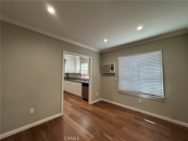 1828 New Ave, San Gabriel, CA 91776 - empty room featuring crown molding, baseboards, dark wood-style flooring, recessed lighting, and a sink