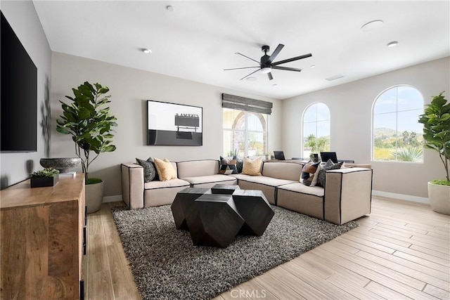 16402 Ginger Creek Dr, Riverside, CA 92504 - living room with a ceiling fan and light wood-style flooring