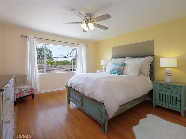 1621 Espinosa Cir, Palos Verdes Estates, CA 90274 - bedroom with wood finished floors, baseboards, and ceiling fan