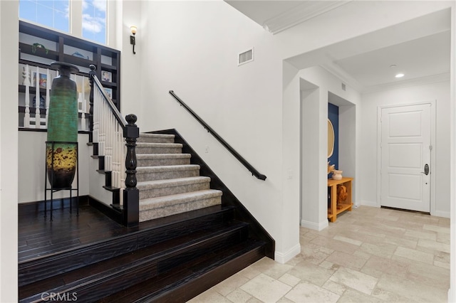 15020 Applewood Ct, San Diego, CA 92131 - stairway featuring crown molding, baseboards, stone tile flooring, and recessed lighting