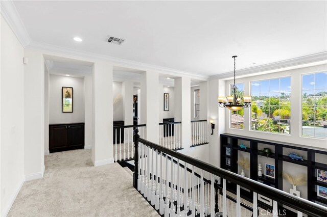 15020 Applewood Ct, San Diego, CA 92131 - hallway with an upstairs landing, a chandelier, baseboards, carpet flooring, and crown molding