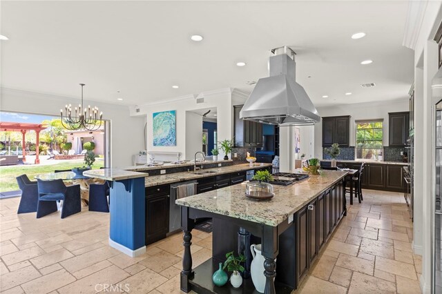 15020 Applewood Ct, San Diego, CA 92131 - kitchen with island range hood, stone tile floors, a breakfast bar area, appliances with stainless steel finishes, and decorative backsplash