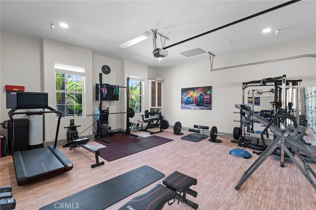15020 Applewood Ct, San Diego, CA 92131 - gym with wood finished floors and recessed lighting