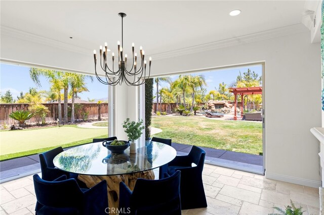 15020 Applewood Ct, San Diego, CA 92131 - dining area featuring stone tile flooring, a chandelier, ornamental molding, baseboards, and recessed lighting