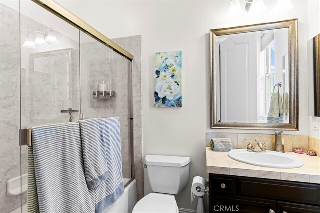 15020 Applewood Ct, San Diego, CA 92131 - bathroom featuring vanity, toilet, and combined bath / shower with glass door