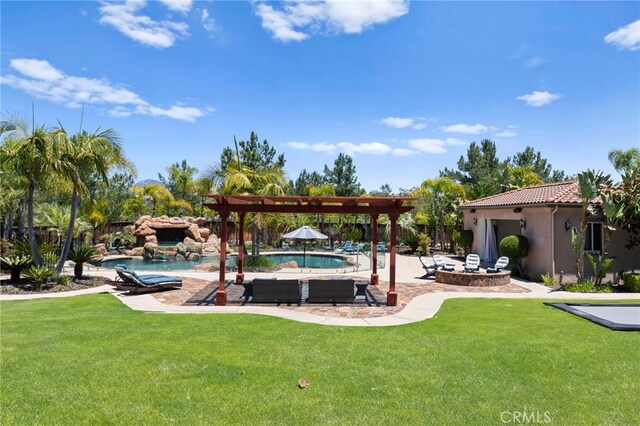 15020 Applewood Ct, San Diego, CA 92131 - view of grassy yard with an outdoor pool and a patio