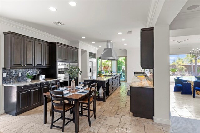 15020 Applewood Ct, San Diego, CA 92131 - dining area with stone tile flooring, recessed lighting, and crown molding