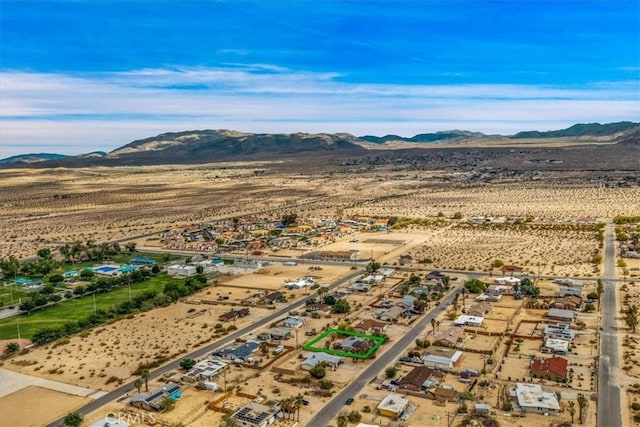 5799 Halsey Ave Unit 29, Palms, CA 92277 - view of rural area featuring a mountain backdrop, a desert landscape, and property parcel outlined