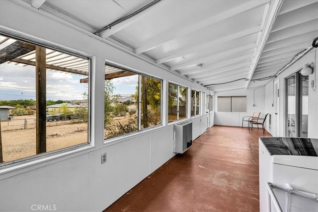 5799 Halsey Ave Unit 29, Palms, CA 92277 - unfurnished sunroom featuring finished concrete floors and beam ceiling