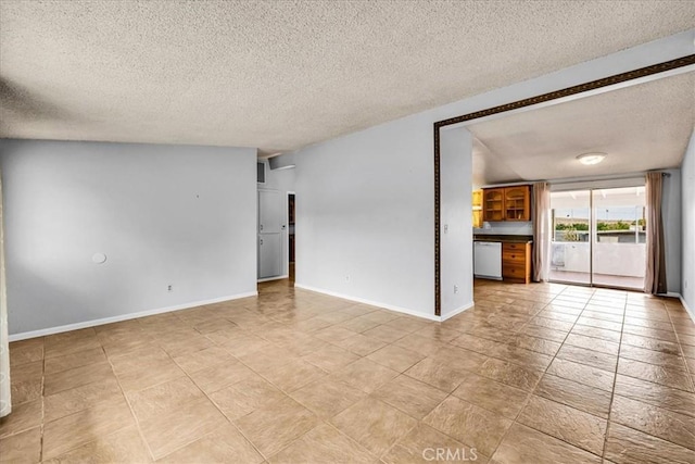5799 Halsey Ave Unit 29, Palms, CA 92277 - unfurnished room with a textured ceiling and baseboards
