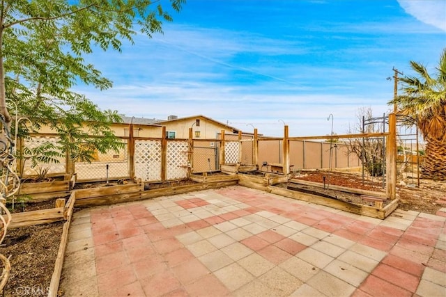 5799 Halsey Ave Unit 29, Palms, CA 92277 - view of patio featuring a fenced backyard