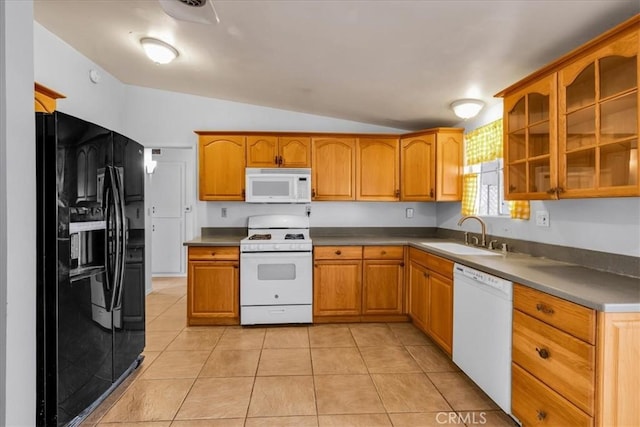 5799 Halsey Ave Unit 29, Palms, CA 92277 - kitchen featuring white appliances, a sink, vaulted ceiling, glass insert cabinets, and brown cabinets