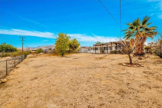 5799 Halsey Ave Unit 29, Palms, CA 92277 - fenced backyard featuring a mountain view