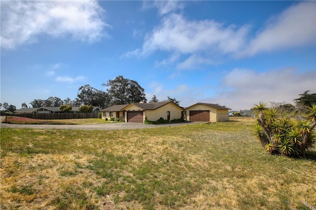 2661 Southview Ave, Arroyo Grande, CA 93420 - view of yard with driveway and an attached garage