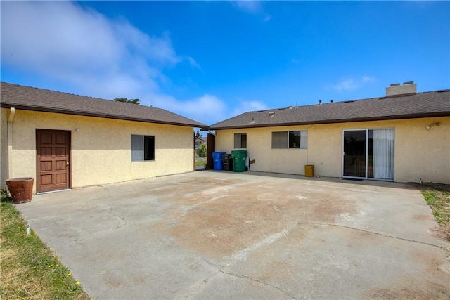 2661 Southview Ave, Arroyo Grande, CA 93420 - rear view of property featuring stucco siding and a patio