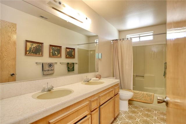 2661 Southview Ave, Arroyo Grande, CA 93420 - full bathroom with toilet, shower / tub combo with curtain, double vanity, and tile patterned flooring
