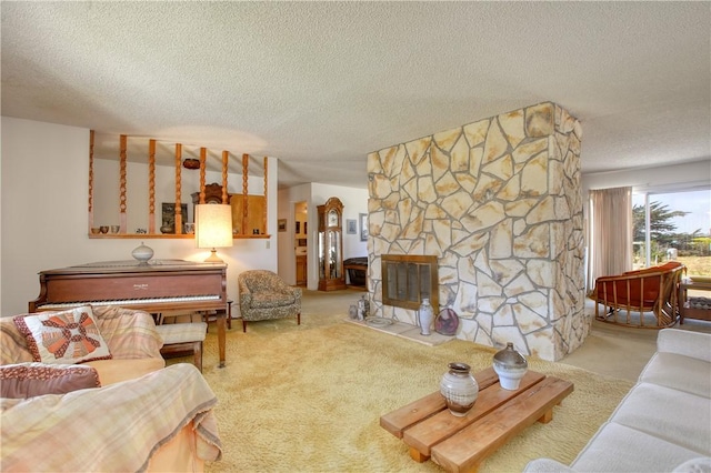 2661 Southview Ave, Arroyo Grande, CA 93420 - carpeted living room featuring a textured ceiling and a stone fireplace