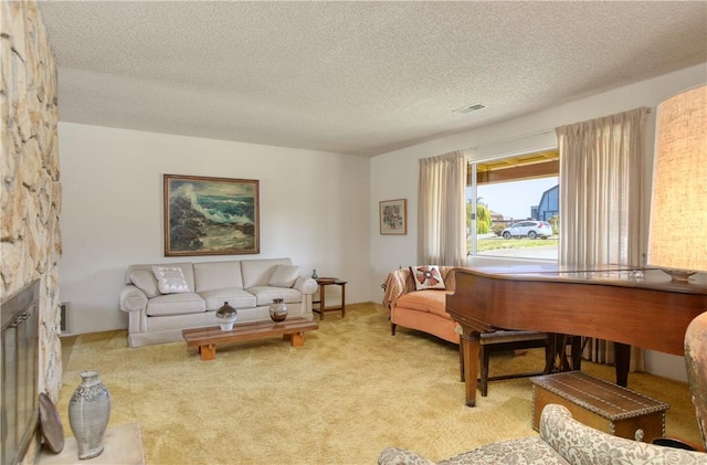 2661 Southview Ave, Arroyo Grande, CA 93420 - carpeted living room featuring a textured ceiling and a fireplace