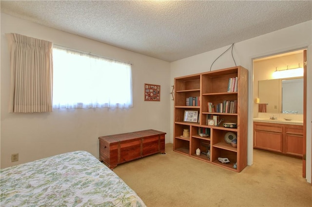 2661 Southview Ave, Arroyo Grande, CA 93420 - bedroom with a sink, light carpet, a textured ceiling, and ensuite bath