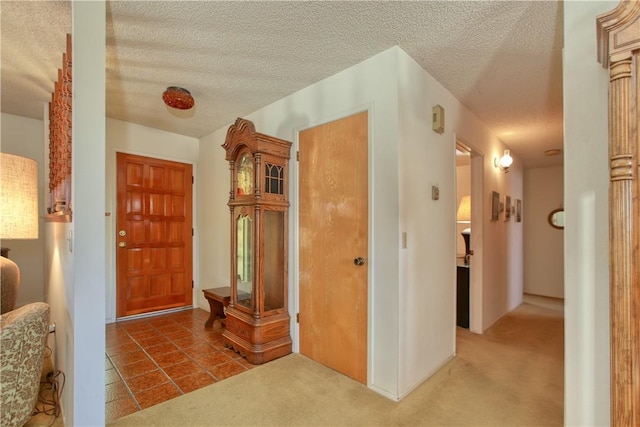 2661 Southview Ave, Arroyo Grande, CA 93420 - corridor with a textured ceiling, carpet, and water heater