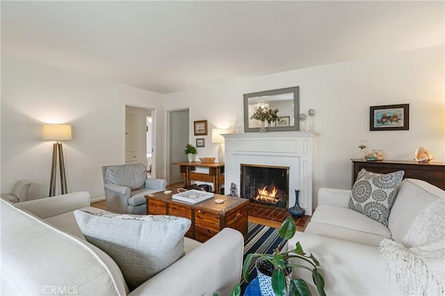 1981 Sinaloa Ave, Altadena, CA 91001 - living room featuring a fireplace, wood finished floors, and baseboards