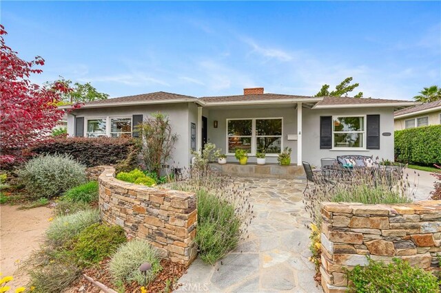 1981 Sinaloa Ave, Altadena, CA 91001 - ranch-style house with stucco siding, a patio area, and a chimney