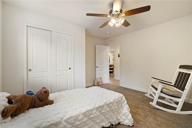 1612 San Jose Ln, Paradise, CA 95969 - carpeted bedroom featuring a closet, baseboards, and a ceiling fan
