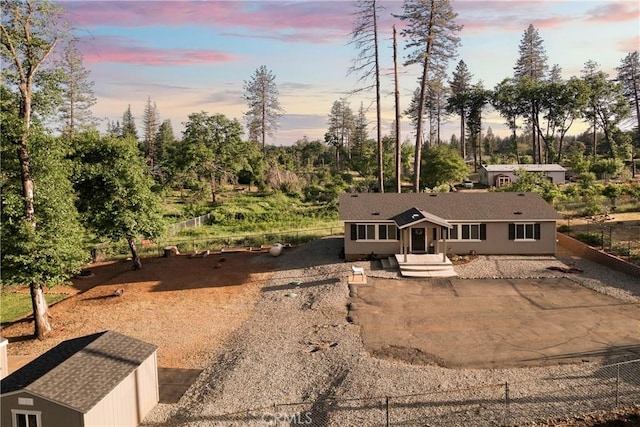 1612 San Jose Ln, Paradise, CA 95969 - view of front facade with view of wooded area