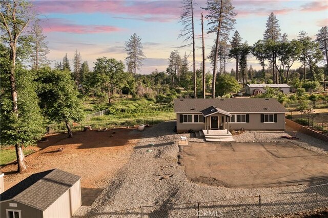 1612 San Jose Ln, Paradise, CA 95969 - view of front of property with view of wooded area