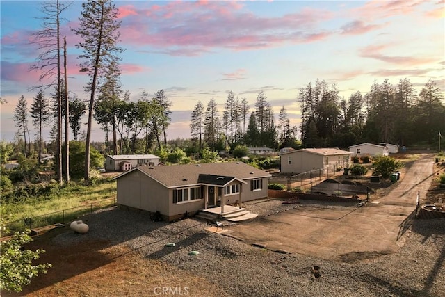 1612 San Jose Ln, Paradise, CA 95969 - view of subject property with a tree filled landscape