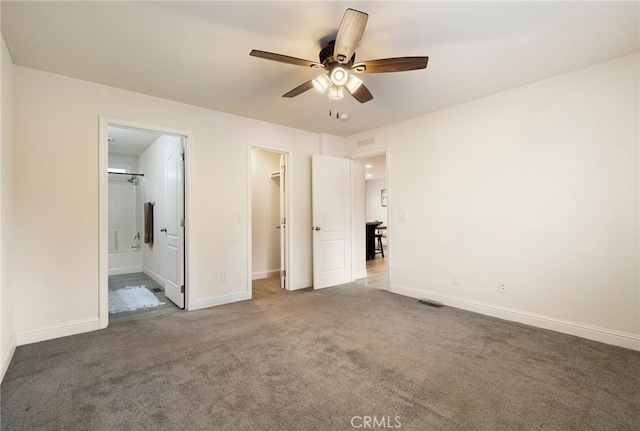 1612 San Jose Ln, Paradise, CA 95969 - unfurnished bedroom featuring carpet flooring, a spacious closet, baseboards, connected bathroom, and a closet