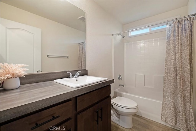 1612 San Jose Ln, Paradise, CA 95969 - full bathroom with toilet, vanity, shower / bath combination with curtain, and wood finished floors
