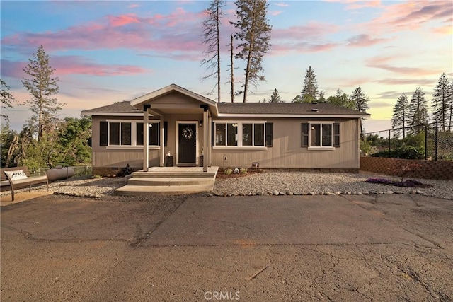 1612 San Jose Ln, Paradise, CA 95969 - view of front of home with crawl space, fence, and a shingled roof