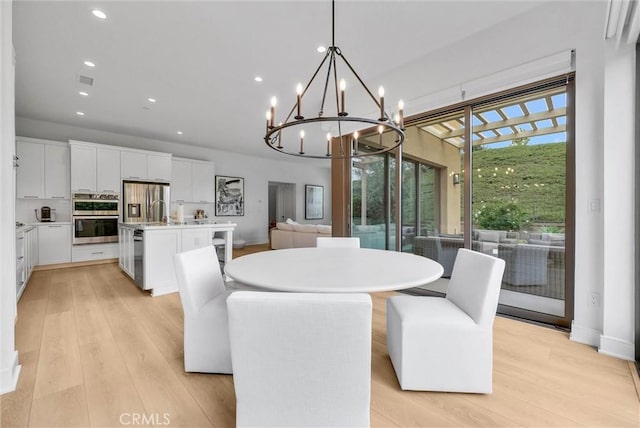 107 Plum Lily, Irvine, CA 92618 - dining area with a chandelier, recessed lighting, and light wood-style floors