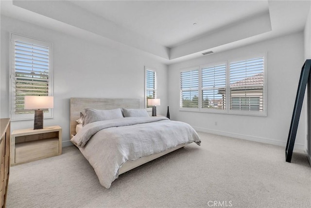 107 Plum Lily, Irvine, CA 92618 - bedroom with a tray ceiling, multiple windows, and carpet