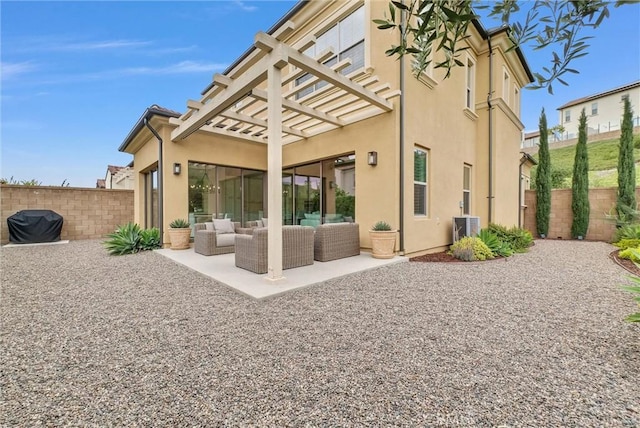 107 Plum Lily, Irvine, CA 92618 - back of property featuring an outdoor living space, a pergola, fence, a patio area, and stucco siding