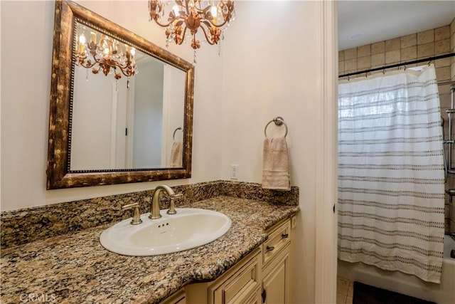 23180 Gray Fox Dr, Canyon Lake, CA 92587 - bathroom with a chandelier, vanity, and shower / bathtub combination with curtain