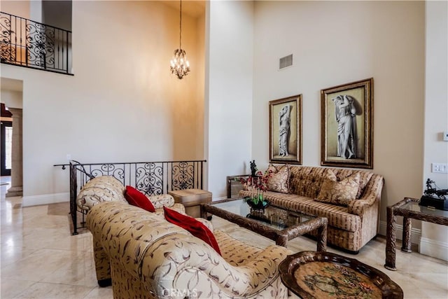 23180 Gray Fox Dr, Canyon Lake, CA 92587 - living area with a towering ceiling, a chandelier, and baseboards