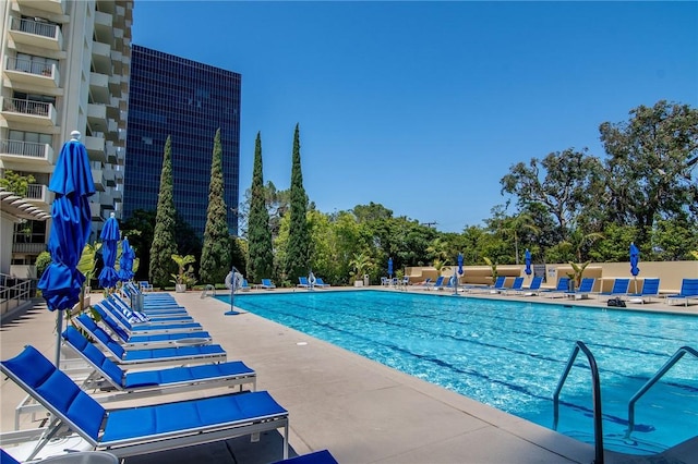 community pool featuring a patio area
