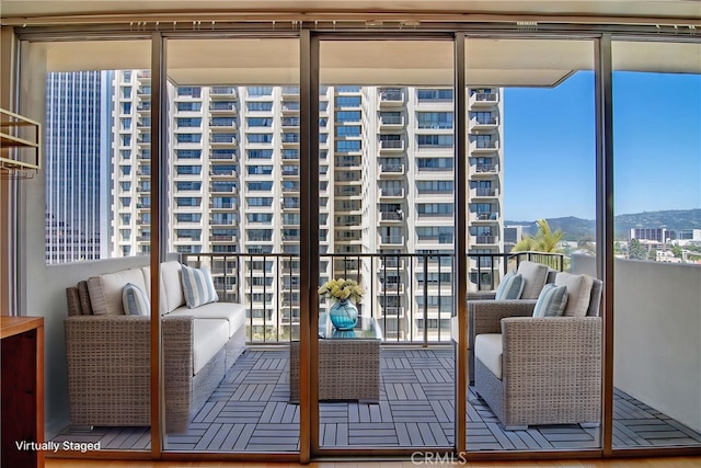 balcony featuring a mountain view