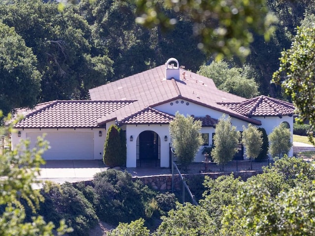 14800 Santa Ana Rd, Atascadero, CA 93422 - mediterranean / spanish-style home featuring a tiled roof, a garage, driveway, and stucco siding