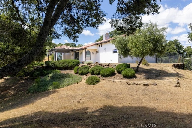 14800 Santa Ana Rd, Atascadero, CA 93422 - view of front of property featuring stucco siding, a chimney, and a tile roof