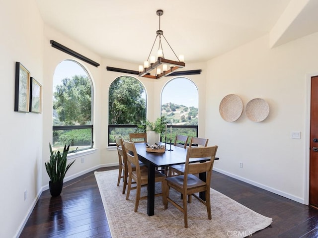 14800 Santa Ana Rd, Atascadero, CA 93422 - dining space with dark wood-type flooring, a chandelier, and baseboards
