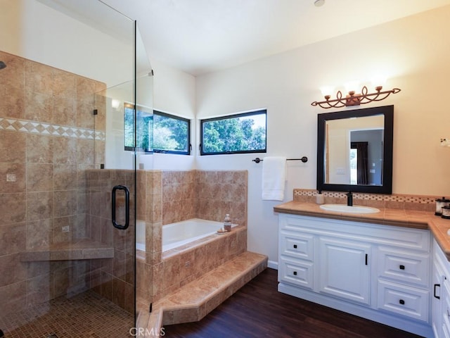 14800 Santa Ana Rd, Atascadero, CA 93422 - full bath featuring vanity, a garden tub, a stall shower, and wood finished floors