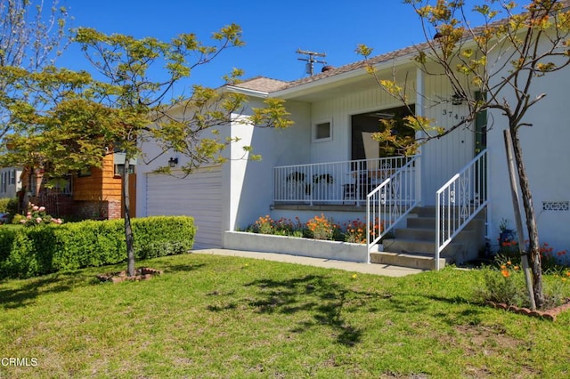 3749 Fairesta St, La Crescenta, CA 91214 - view of front facade with a front yard, an attached garage, and a porch