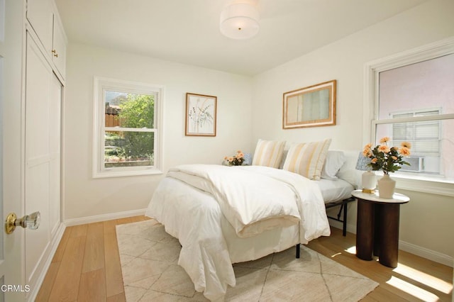 3749 Fairesta St, La Crescenta, CA 91214 - bedroom featuring light wood finished floors, baseboards, and a closet