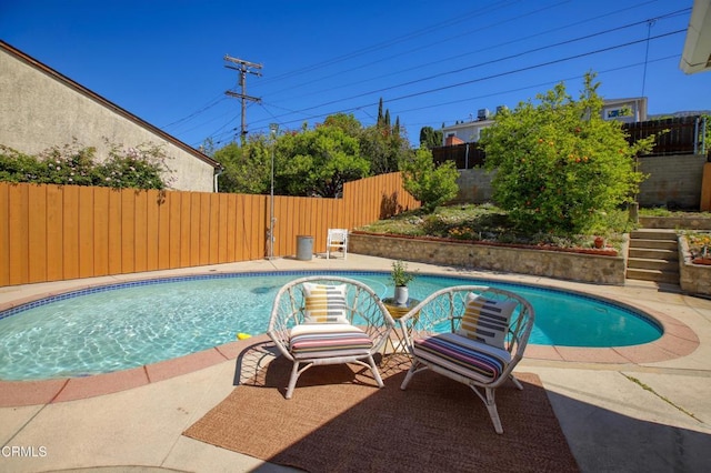 3749 Fairesta St, La Crescenta, CA 91214 - view of swimming pool featuring a fenced backyard and a patio
