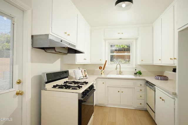 3749 Fairesta St, La Crescenta, CA 91214 - kitchen with white appliances, under cabinet range hood, a sink, light wood-type flooring, and healthy amount of natural light