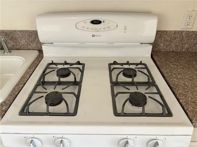 6688 Yucca Ave Unit 29, Palms, CA 92277 - kitchen view of white gas range